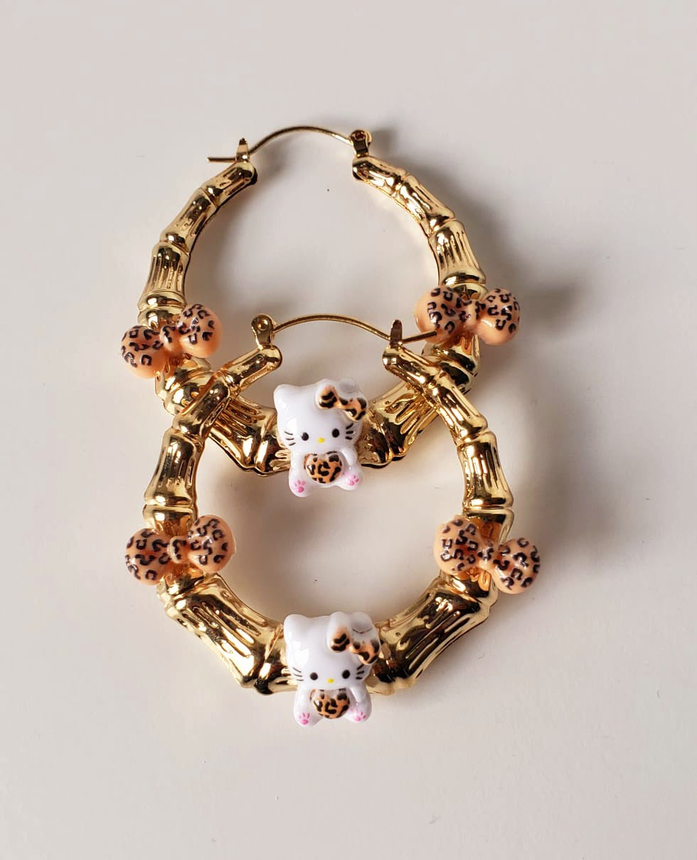 Gold-plated Hoop Earrings HK with Charms and Bows