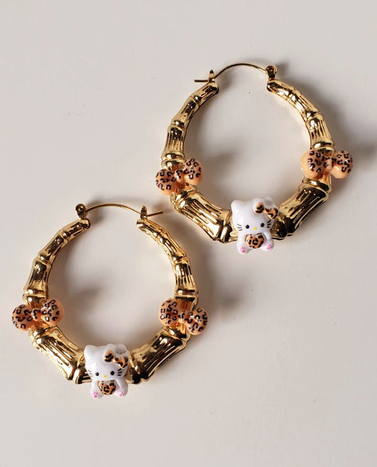 Gold-plated Hoop Earrings HK with Charms and Bows